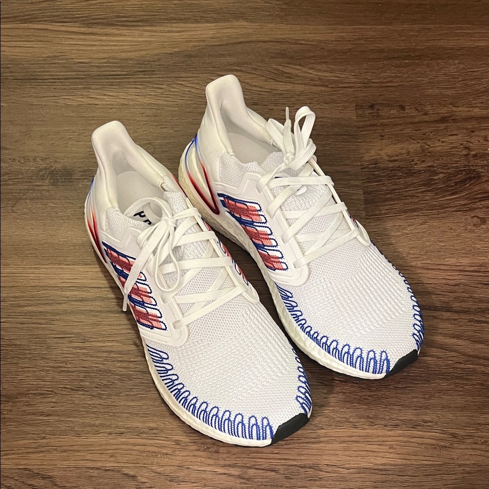 Adidas Ultraboosts White Athletic Shoes with Red and Blue Accents
